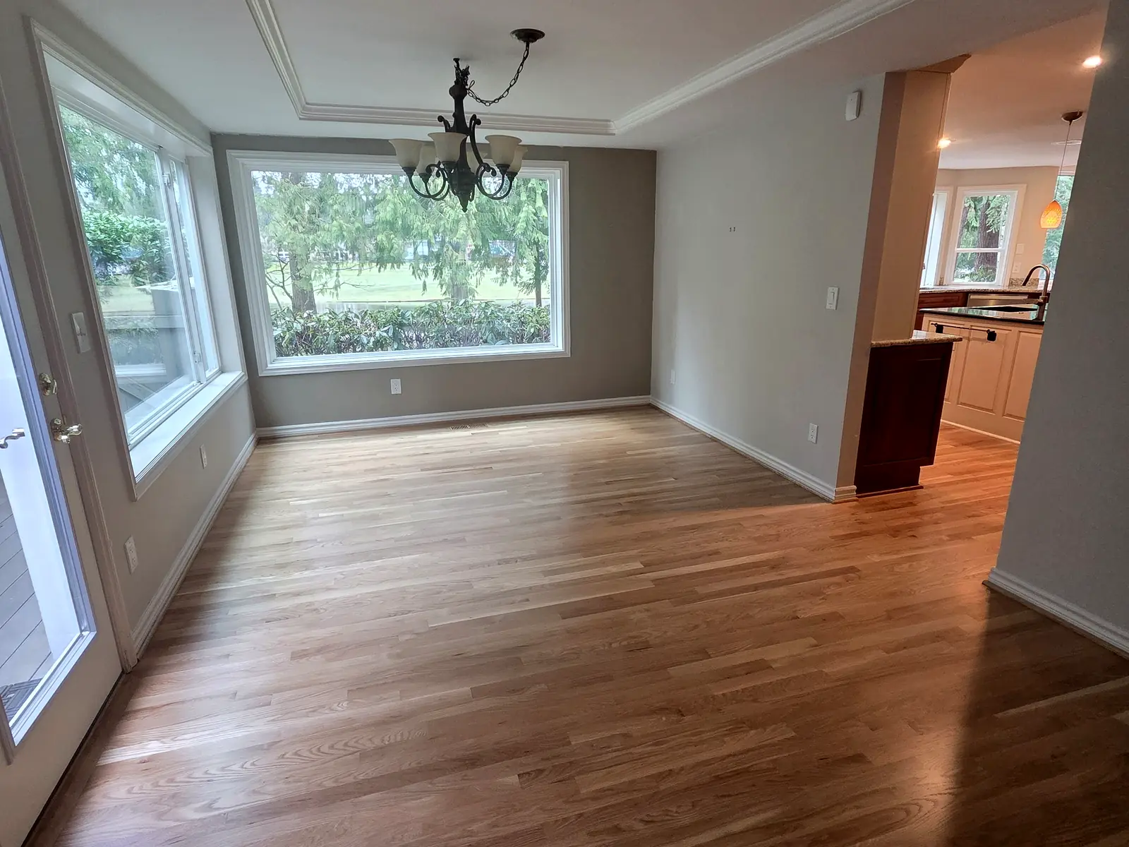 A refinished floor in an empty dining room, Mill Creek