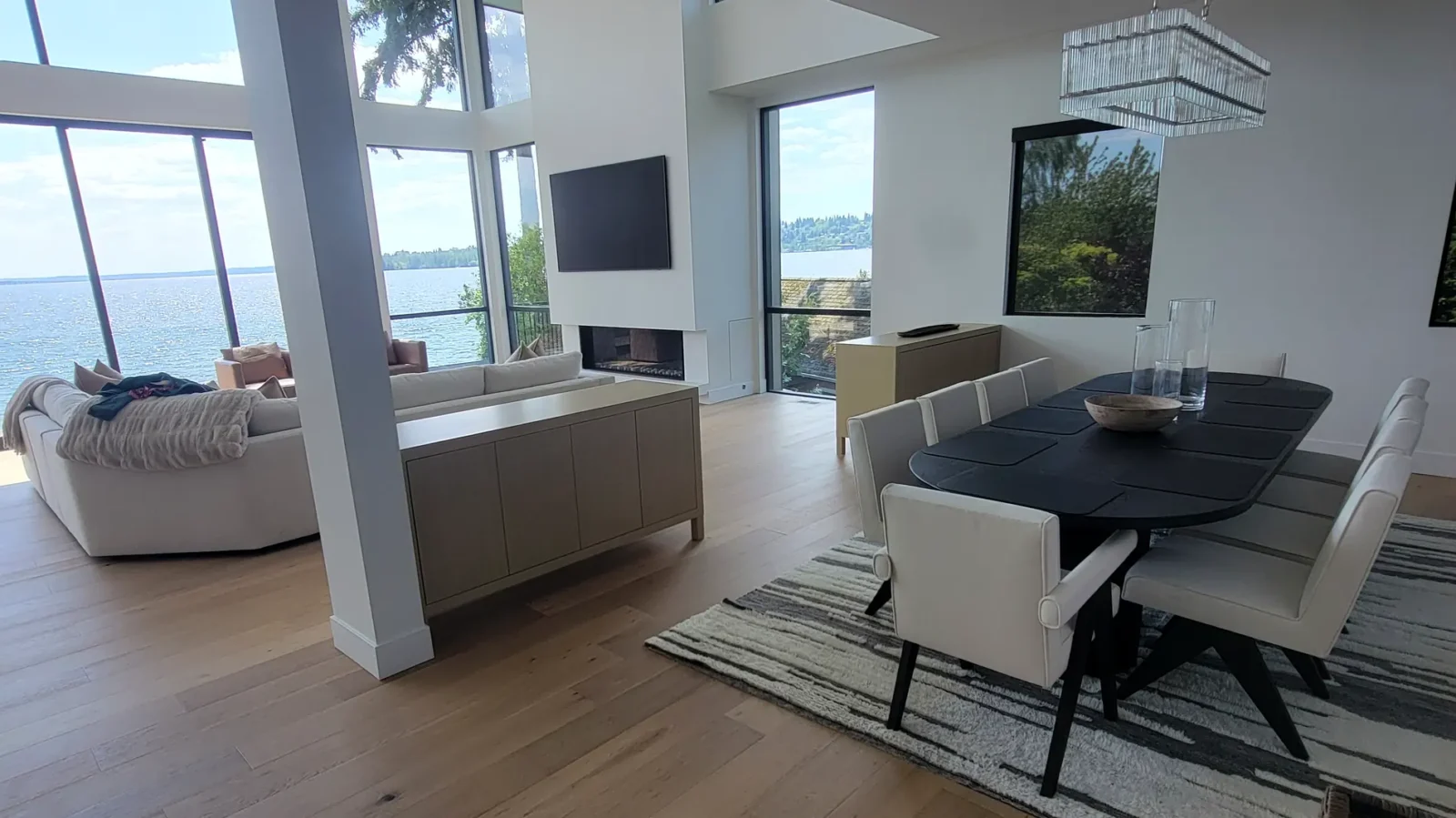 Prefinished plank running through the living room of a waterfront home in Kirkland