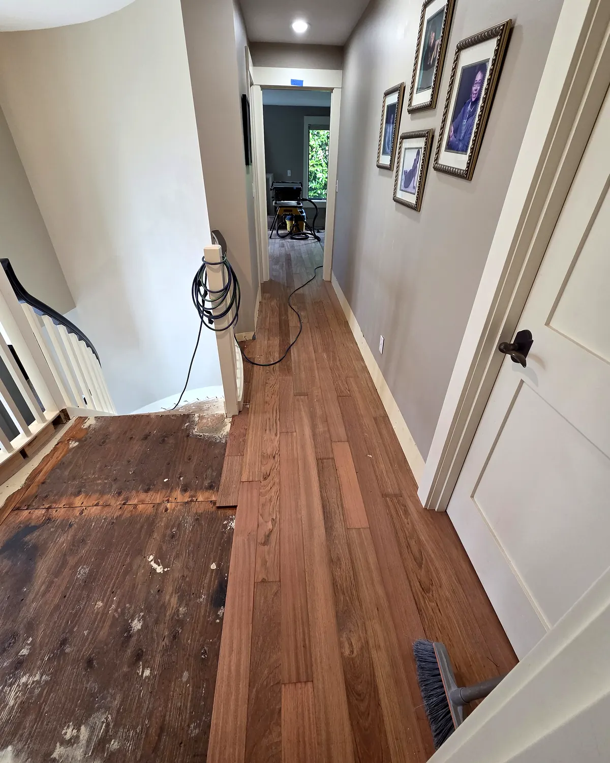 The old floor and the new floor meeting in the hallway, Mercer Island