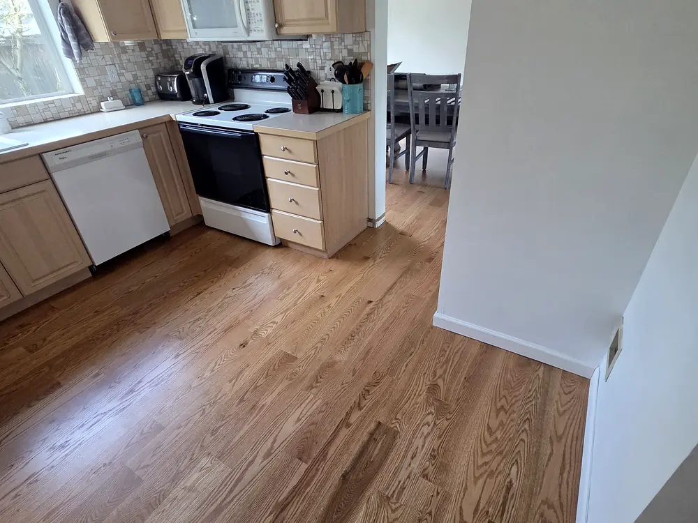 Red oak refinished through the kitchen
